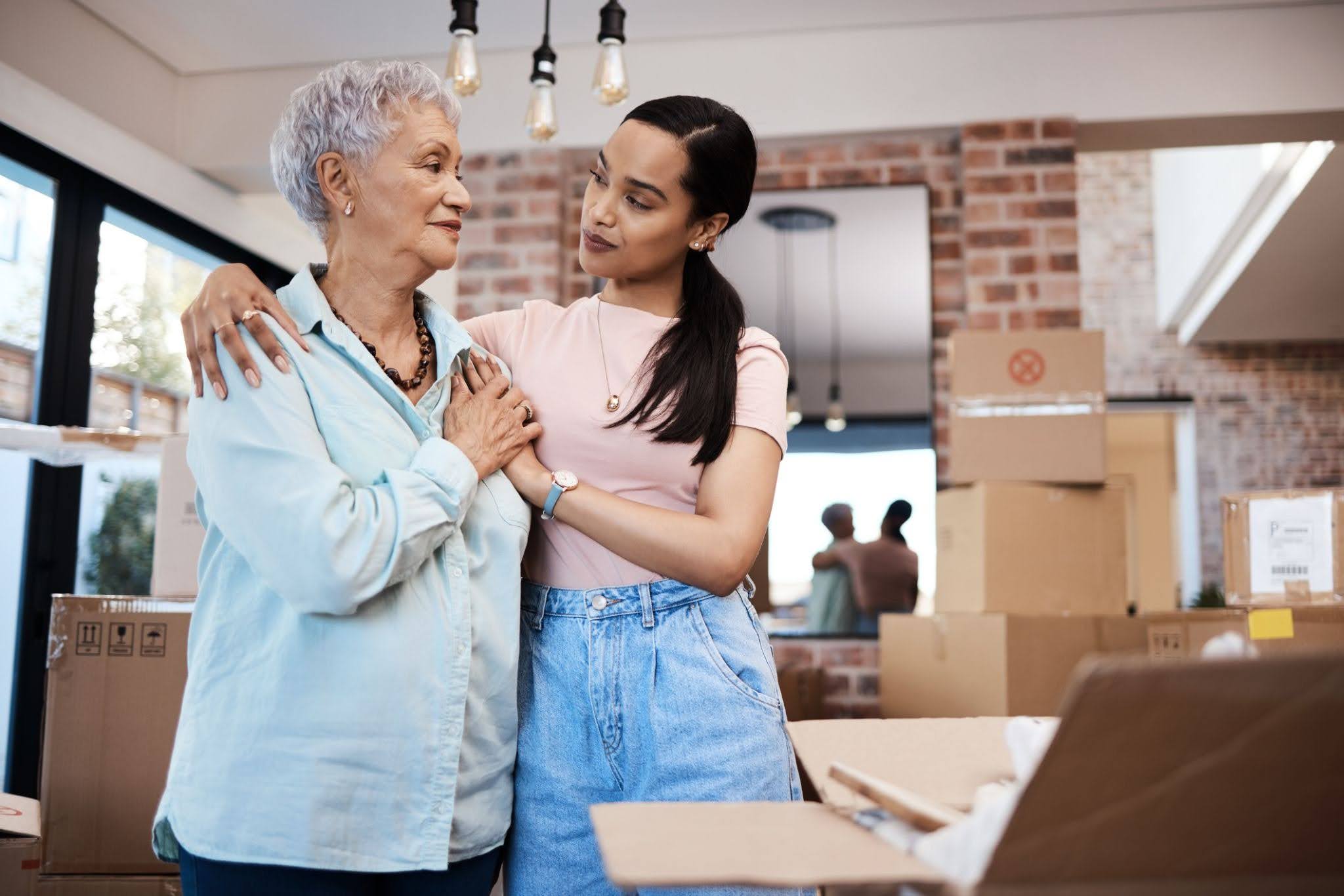 senior-daughter An adult daughter talking with her senior mother on a assisted living checklist to have a seamless transition.
